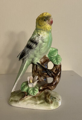 shiny yellow green parakeet figurine
