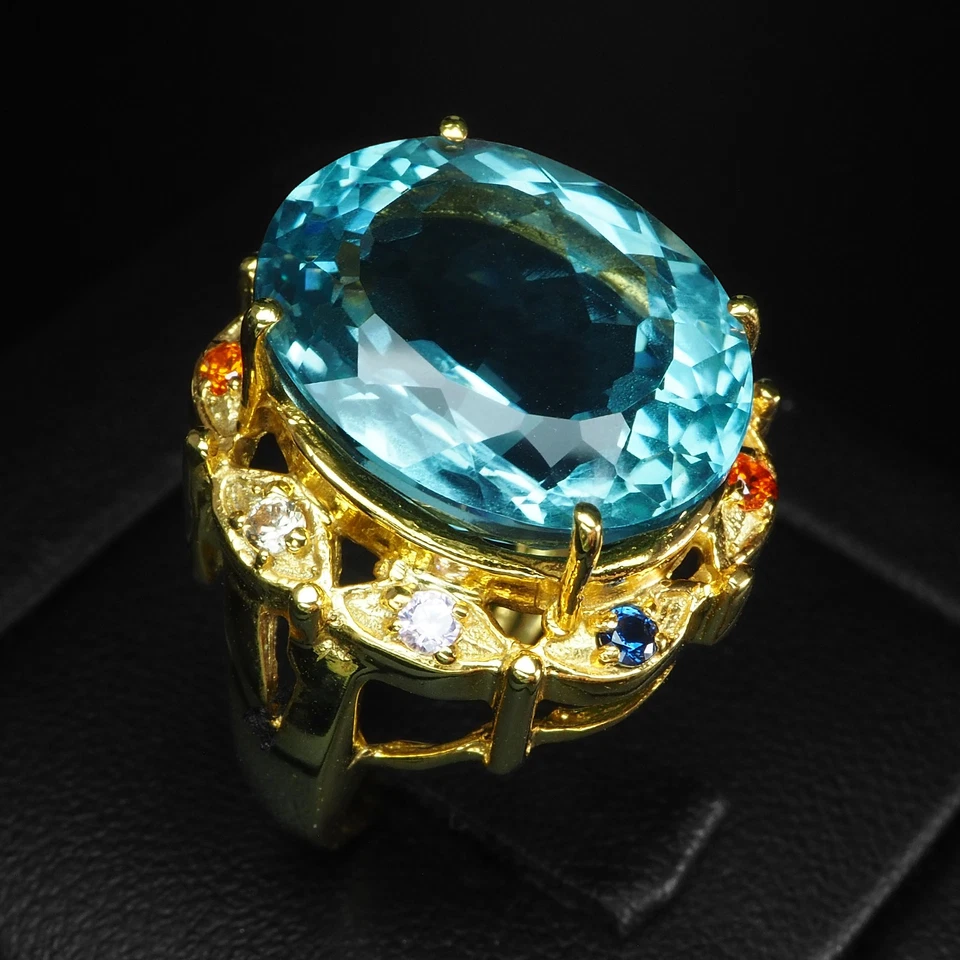 Anillos de oro de 24 quilates de plata de ley 925 bebé topacio azul suizo ovalados 13,48 quilates talla 5,75 Foto 4 de 4