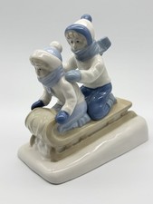 Statuina porcellana vintage 1992 Porcelana de Cuernavaca bambini su slitta Messico