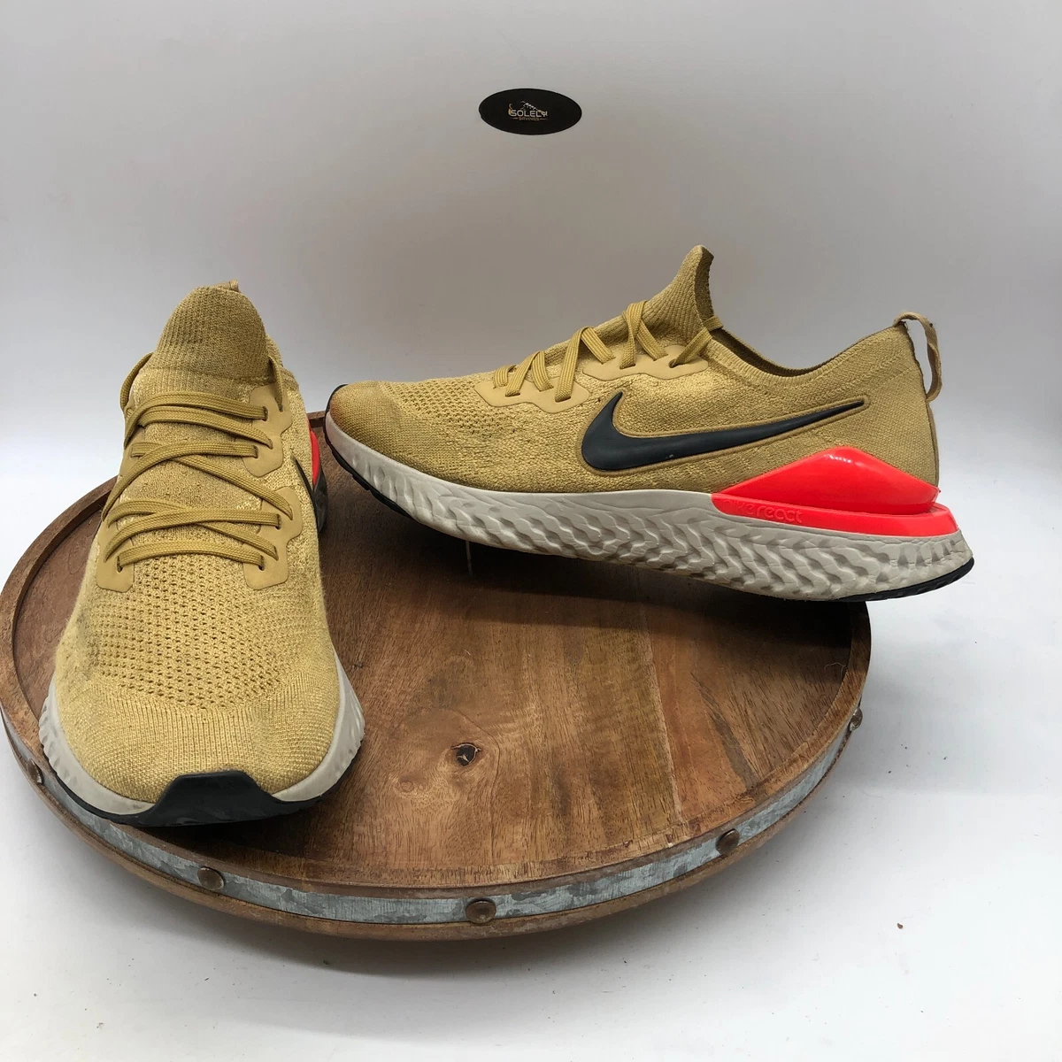 Nike epic react flyknit 2 cheap club gold black red orbit