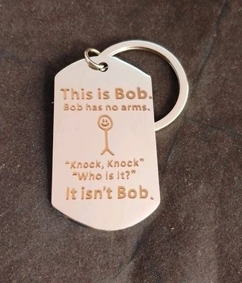 "It Isn't Bob"! Novelty keyring. Hard-wearing Etched Metal, Single Loop. - Image 1 of 2