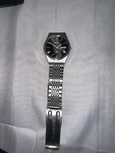 Vintage Seiko 7N32 Quartz Day Date Black Dial Silver Tone Mens Watch”