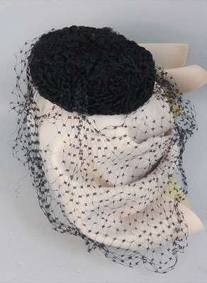 small hat with netting