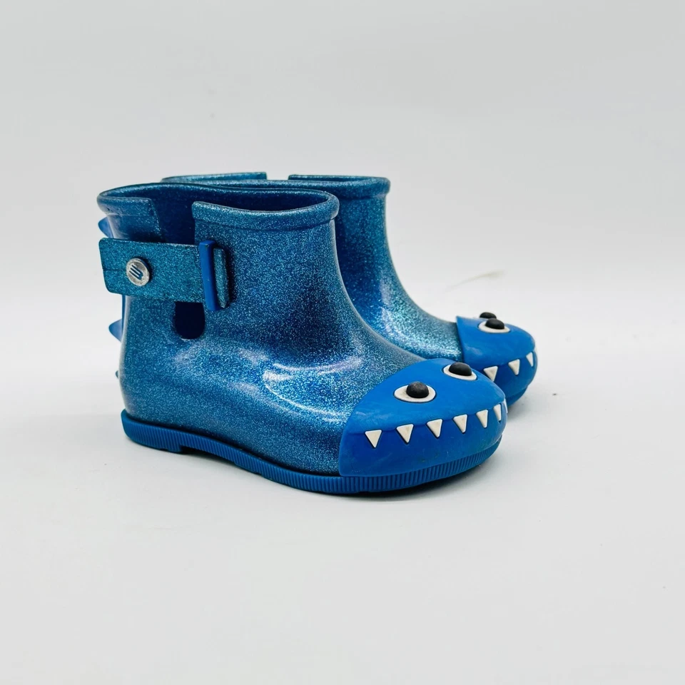 Mini Zapatos Melissa Niñas 7C Botas Azules Monstruo Dinosaurio Botas de Lluvia Fabula Brillo Foto 2 de 4