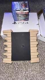 Play Station Slim 1- TB, 3 Controllers, 10 Games, 1 USB mic.  1 Fan/Charge Stand
