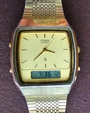 CITIZEN QUARTZ C480-313879 KA Chronograph Dual Time LCD vergoldet Armbanduhr