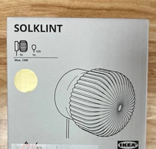 Ikea SOLKLINT Wall lamp, brass/gray clear glass - NEW. Bulb included