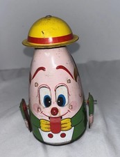 Vintage EIKOW Tinplate Toy Mechanical 6" Egg Head Japan