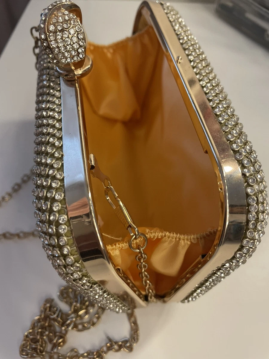 Sparkly gold clutch store