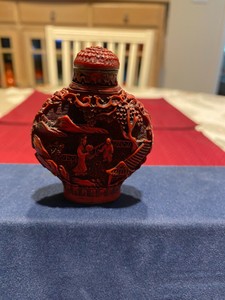 VINTAGE ANTIQUE CHINESE CARVED CINNABAR SNUFF BOTTLE, SIGNED