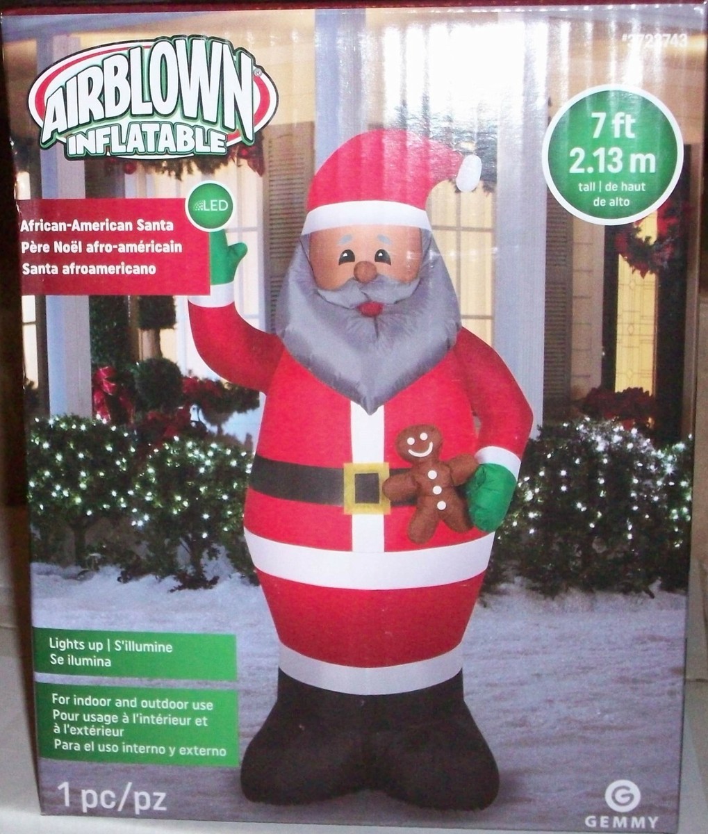 Gemmy 7 Ft Airblown Inflatable Christmas Santa Holding Gingerbread