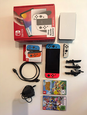 Nintendo Switch OLED 64GB Weiß Joy-Cons Rot/Blau Dock Netzteil HDMI + 2 Spiele