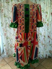 Multi coloured Panto Dame, Green ribbon 48" chest, Purple buttons