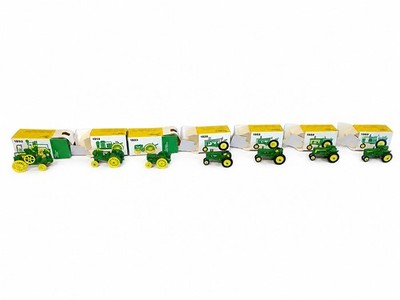Vintage John Deere 7 Miniature Toy Tractors Set Stock No 560 Complete