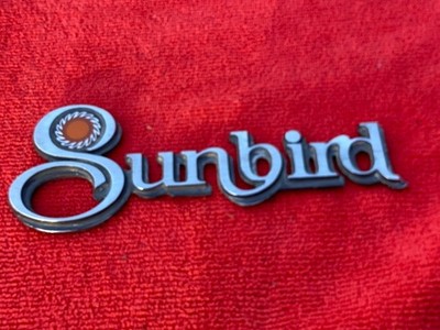76-80 Pontiac Sunbird Script Nameplate Emblem USED