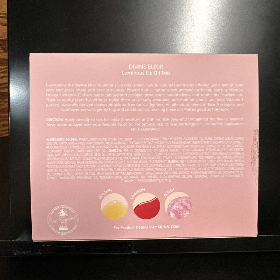Skinn Divine Elixir Palm Oasis Juego de 3 piezas de aceite labial miel de Manuka + Vit C sellado Foto 2 de 4