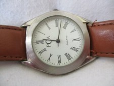 PCA Wristwatch Silver Toned Brown Buckle Band Round White Face Roman Numerals