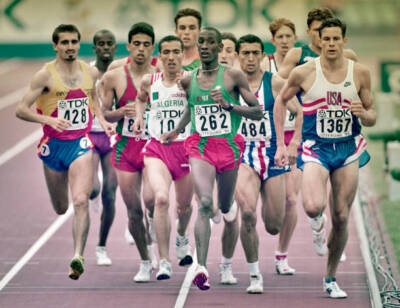 Bronze medalist V�nuste Niyongabo from Burundi leads the pack duri- Old Photo