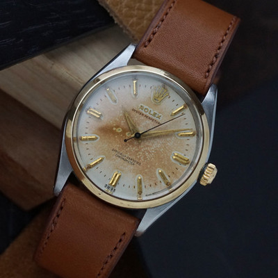 Rolex Oyster Perpetual 6564 Steel/18k Gold Tropical 34 mm
