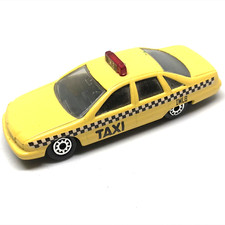 Maisto Chevrolet Chevy Caprice Taxi IMLB 1991 Yellow/Black/White/Red - China