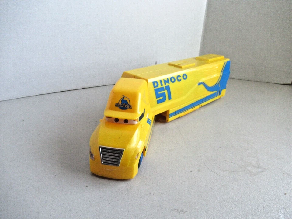 Camión semirremolque Disney Dinoco 51 Cars SOLO plataforma grande amarilla 2017 juego Mattel Foto 2 de 4