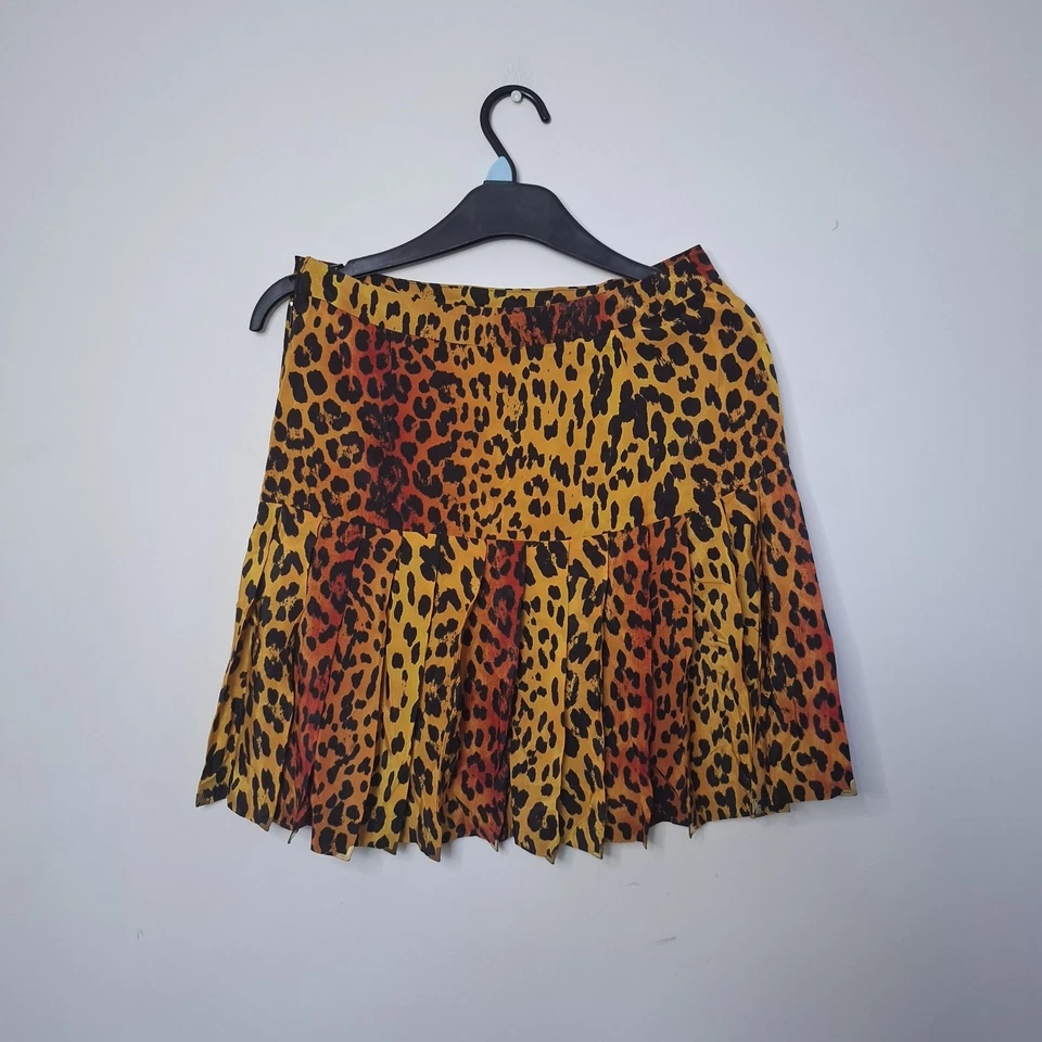 Minifalda VERSACE FOR H&M Icónica Estampado de Leopardo Plisada Seda Cremallera Lateral EE. UU. 4 PEQUEÑA Foto 3 de 4