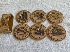 Bolivian Coasters set of 6 plus holder. Made of leather and cork. Handpainted.