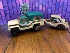 Vintage Tonka Plastic Pickup green and tan with decals And Trailer