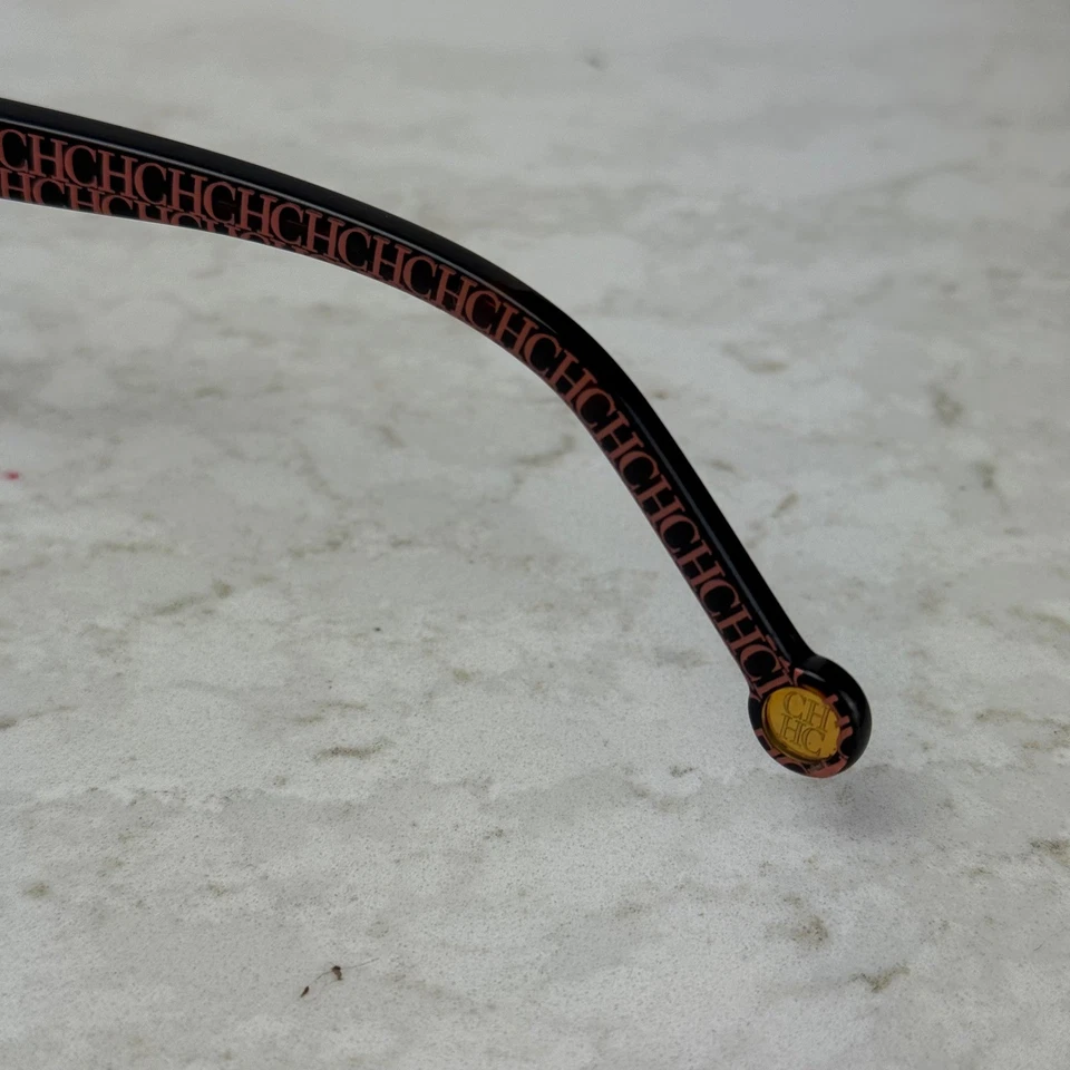 Monturas de gafas de diseñador Carolina Herrera SHE 694 negro marrón logotipo CH Foto 4 de 4