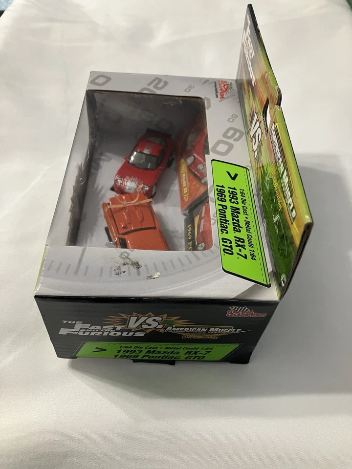Fast and Furious Racing Champions Die Cast set: Mazda RX-7 vs. Pontiac GTO 1:64 - Image 3 of 4