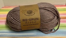 One new skein Lion Brand Re-Spun Thick  Quick yarn