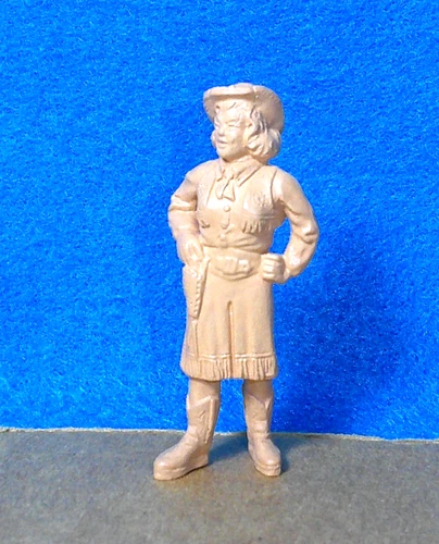Marx 1953 Annie Oakley HTYF character figure in orange/brown