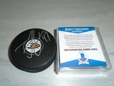 Hampus Lindholm Signed Anaheim Ducks Hockey Puck Autographed Beckett BAS COA 1B
