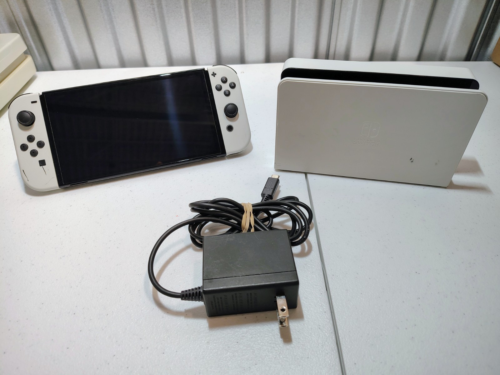 Nintendo Switch OLED Handheld Console 64GB White with Dock, Charger, and Case