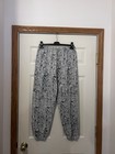Vintage 90s All Over Sports Print Sweatpants XL USA Graphic Joggers Black White — photo 2