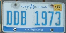 MICHIGAN  Pure  2018  license plate "years on plates"  DDB 1973   