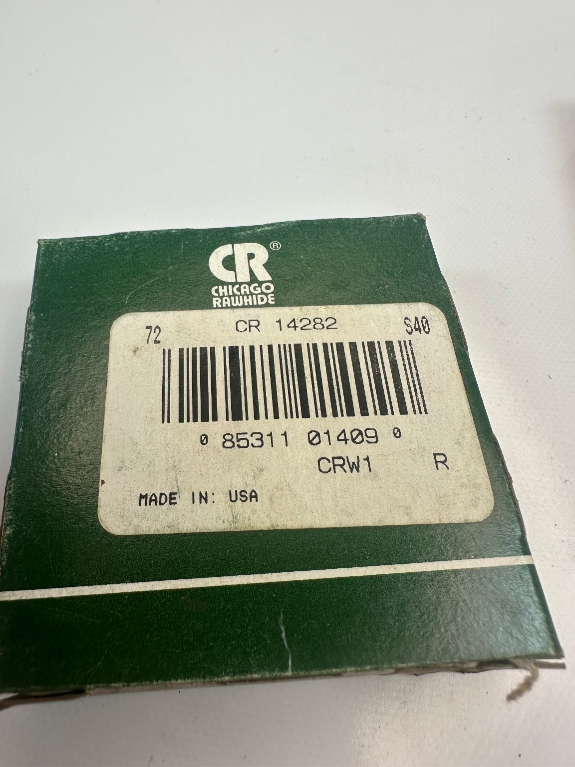 Green CR Chicago Rawhide box with white label, product number 14282, made in U.S.A.
