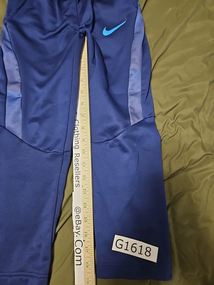 Pantalones de entrenamiento Nike DriFit polar para niños 7L (6-7 años) bolsillos azules Foto 2 de 4