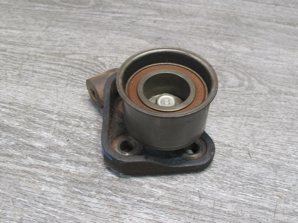 🥇91-99 MITSUBISHI 3000GT ENGINE TIMING BELT TENSIONER PULLEY OEM - Image 3 of 4