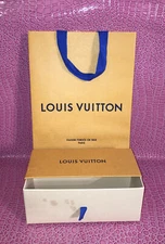 Authentic Louis Vuitton empty Box 9..25”x3.75” X3.75”W/ Shopping  Bag.
