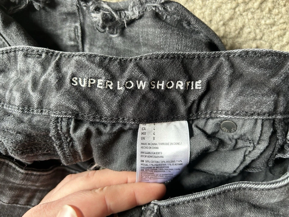 Pantalones cortos negros para mujer American Eagle Outfitters súper bajos talla 4 Foto 4 de 4