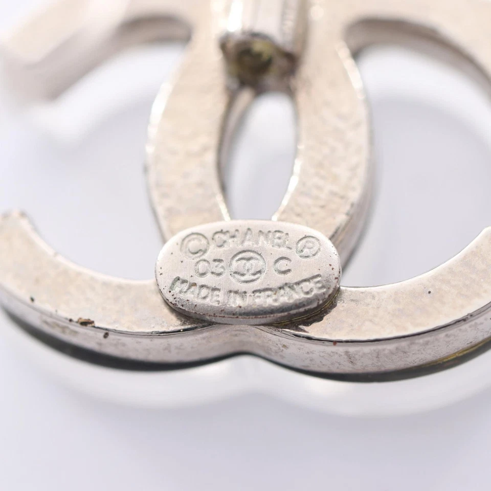 Pendientes perforados marca CHANEL COCO acero inoxidable plástico transparente usados CC Foto 3 de 4