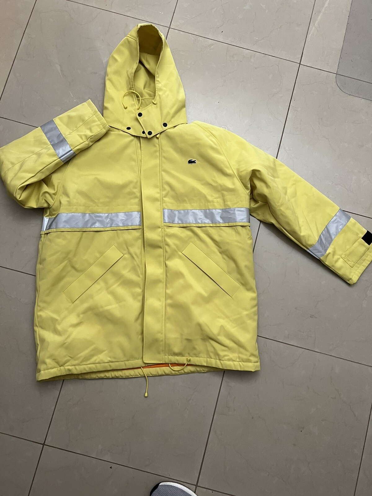 lacoste yellow coat