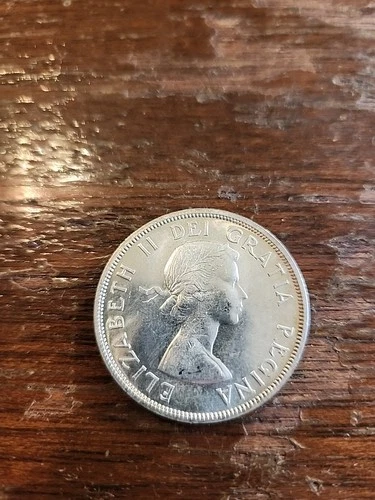 1958 Canada BC Silver Dollar Totem Pole 'Death Dollar' Design, BU