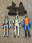 Lot of 4 vintage Kenner Star Wars action figures (1970s), including Boba Fett