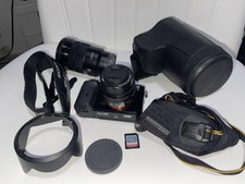 Sony Alpha a7 Mirrorless Camera w/ 2 Lenses, 64gb scandisk and carrying case