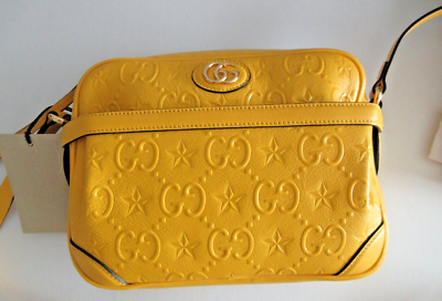 $2,490 GUCCI GG Embossed Star Cross Body Shoulder Bag Yellow $2,490 GUCCI GG Embossed Star Cross Body Shoulder Bag Yellow