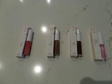 NIB Latest glossier, A vibrant, high-shine lip gloss .14 oz, shades to pick