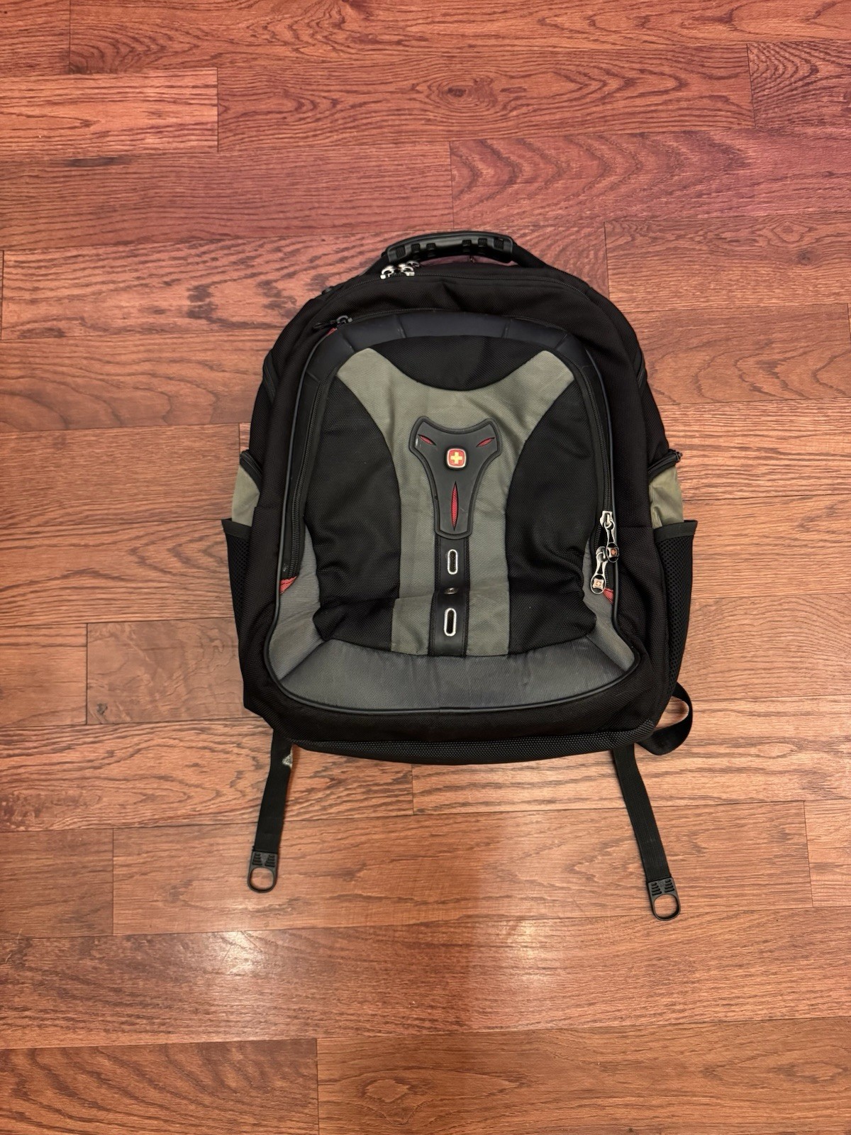 With Many Zippers And Pockets