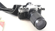 Canon AE-1 35mm Film Camera w/ Rokinon 35-135mm f/3.5-4.5 Lens Tested Working.